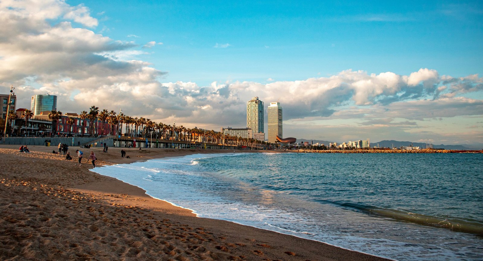 When traveling to Barcelona, spending a day at the beach is a wonderful addition to any trip to Spain's vibrant heart..