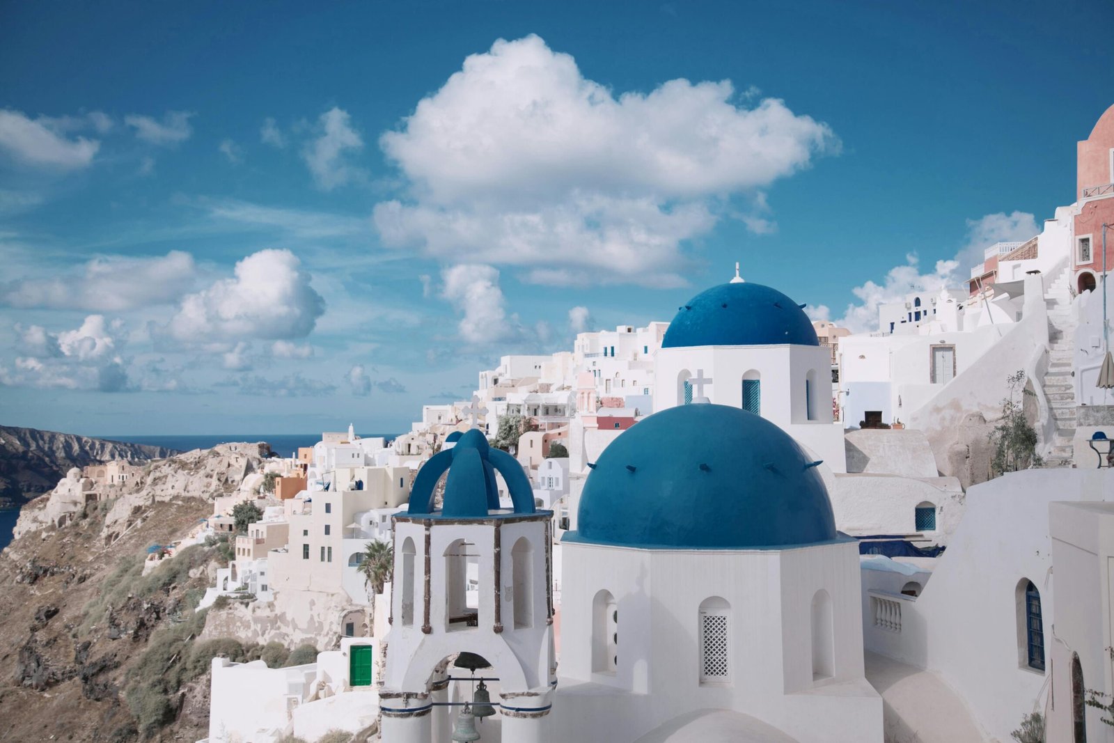 Santorini is one of the best holiday destinations for 30-year-olds. Featured is Santorini's charming architecture.