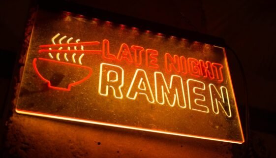 A late night ramen sign lit up somewhere in Tokyo.