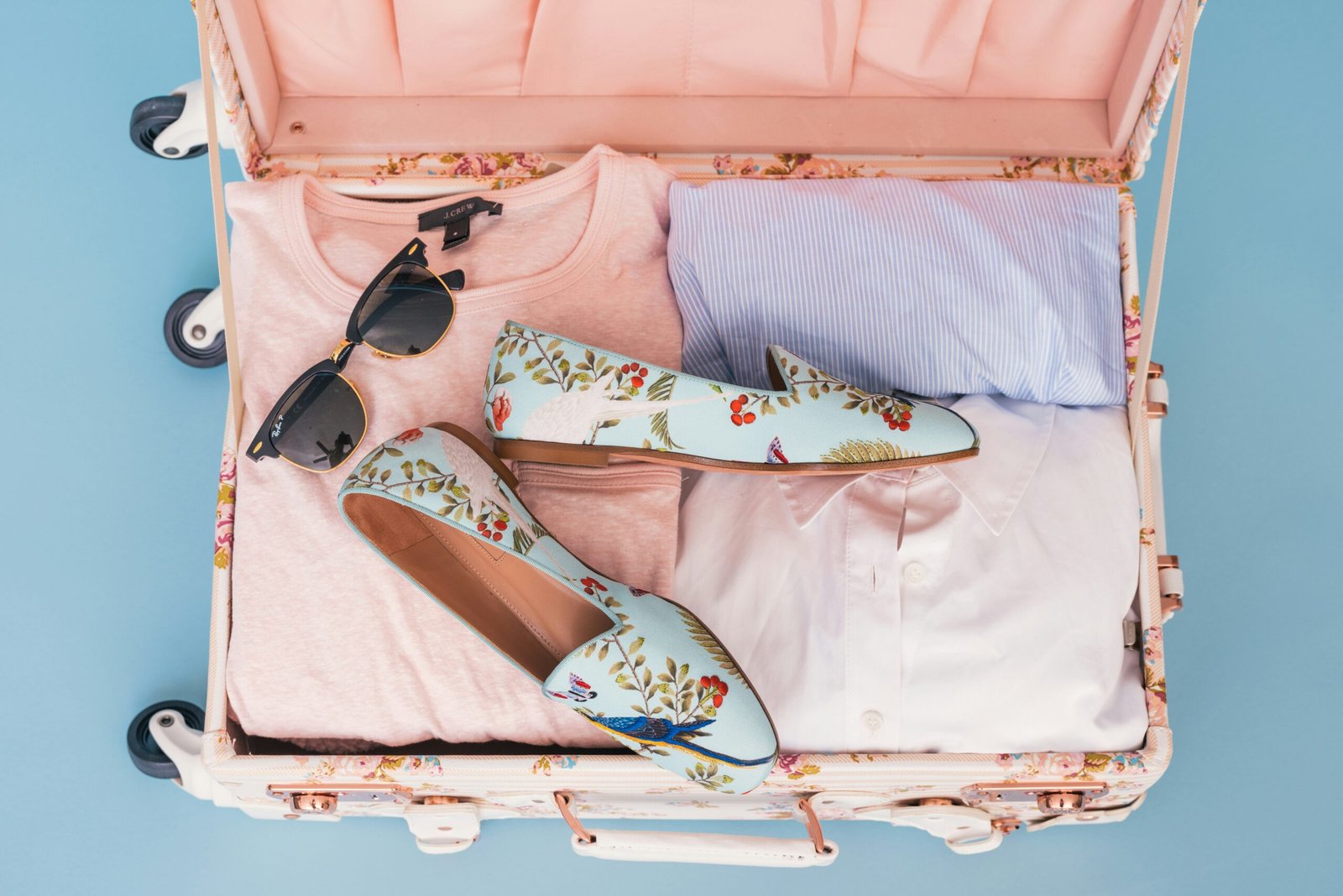 A travel suitcase packed with essentials.