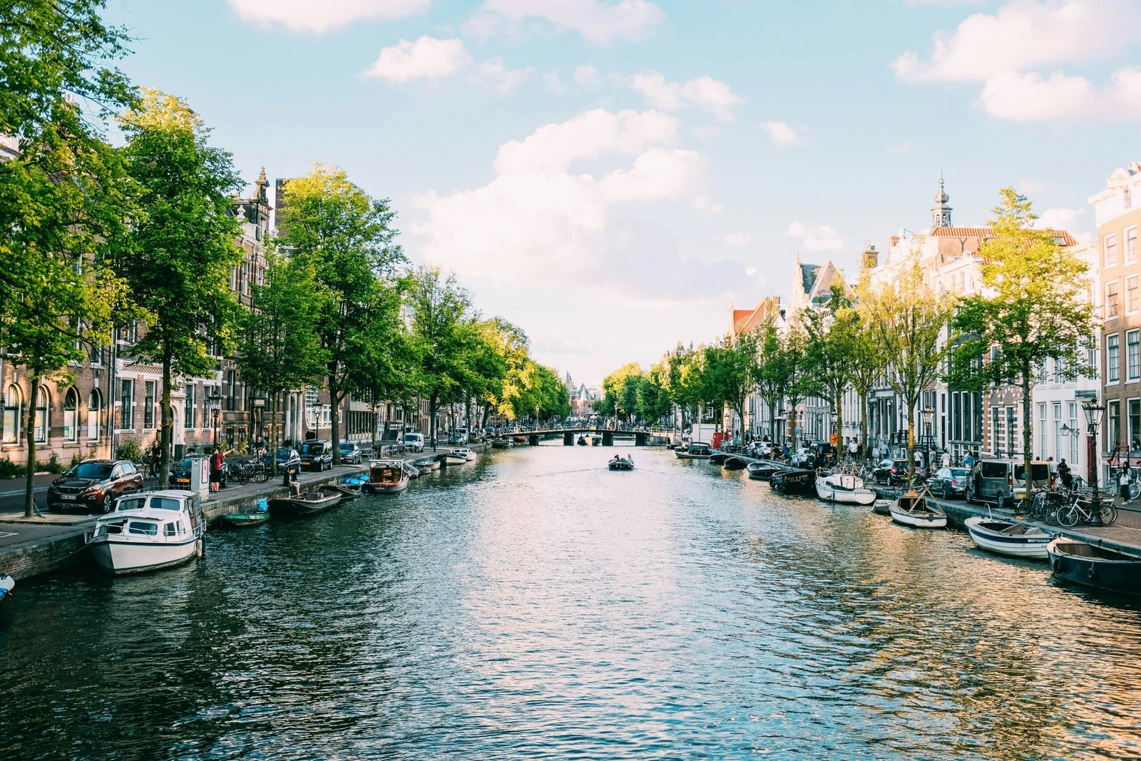 The Netherlands is #7 on our best countries for expats with families. Featured is a canal in Amsterdam.