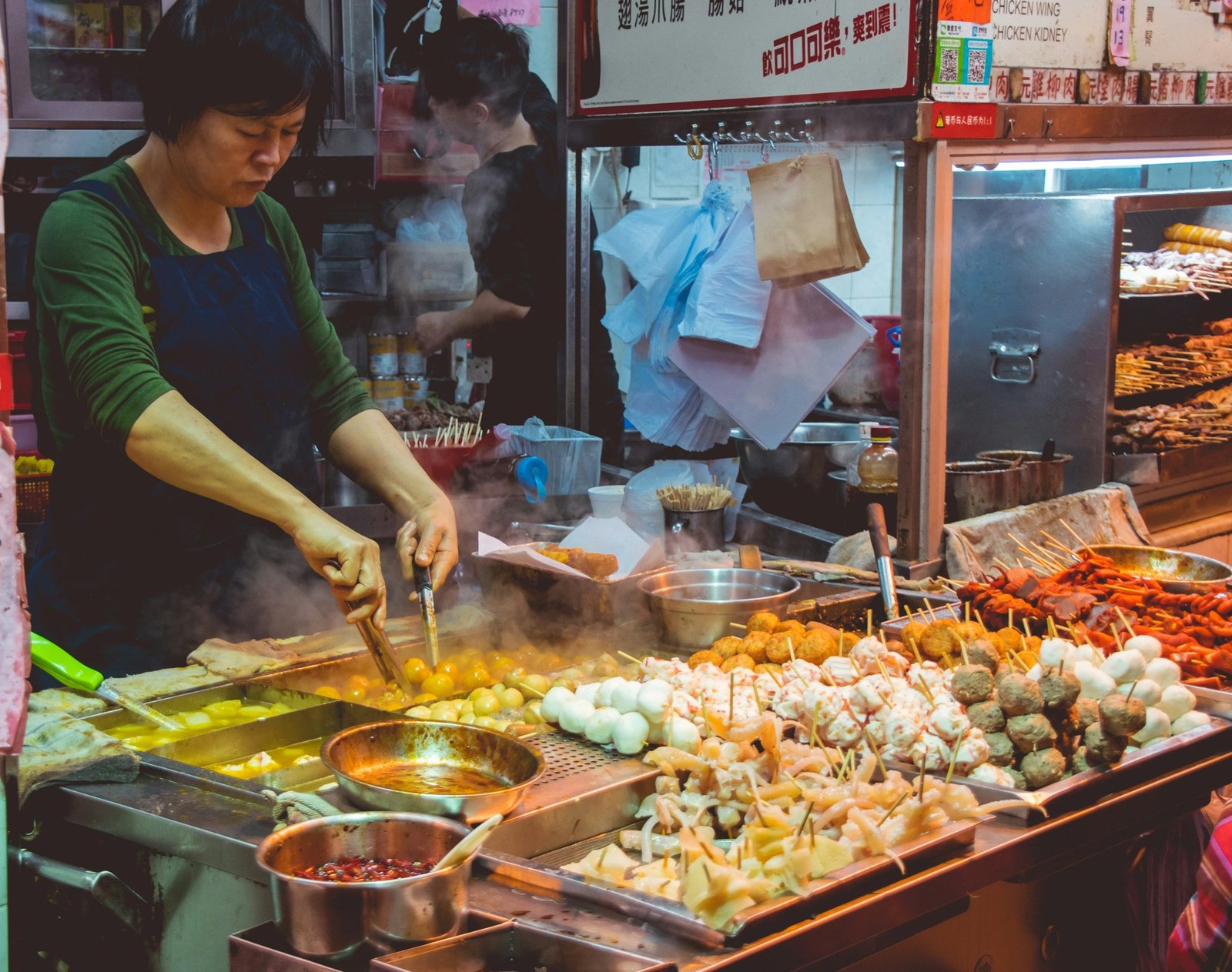 Explore the best things to do in Hong Kong on our travel guide. Featured is one of Hong Kong's food markets.