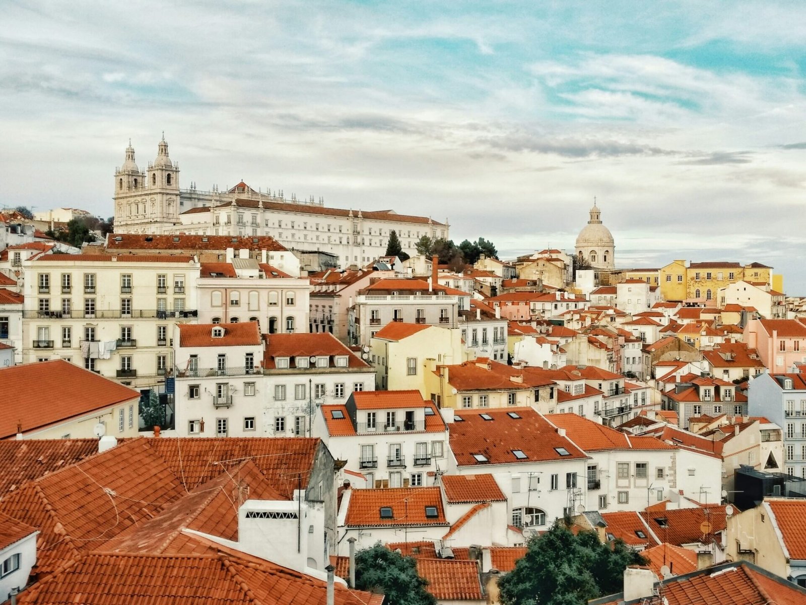 Lisbon is #12 on our Europe travel bucket list. Featured is the stunning cityscape.