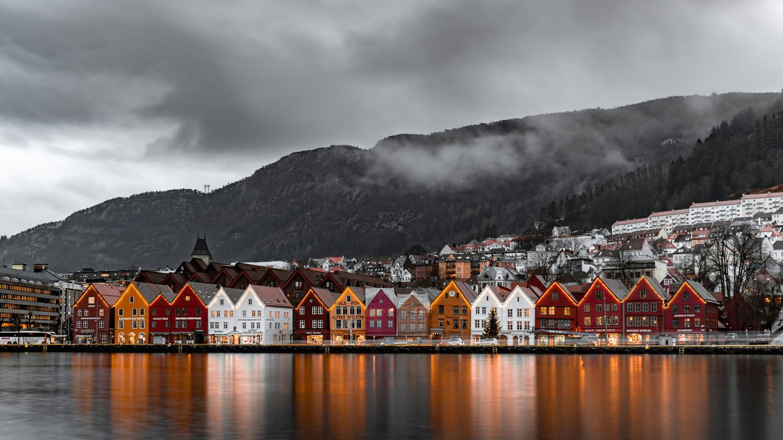 Norway is one of the safest countries in the world for solo travel. Featured is a picture of a charming Norwegian town.