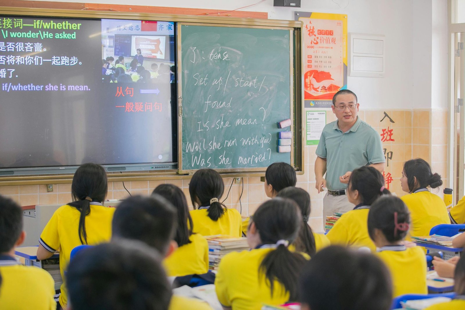 There are many reasons to teach English abroad. Featured is a teacher teaching his class.