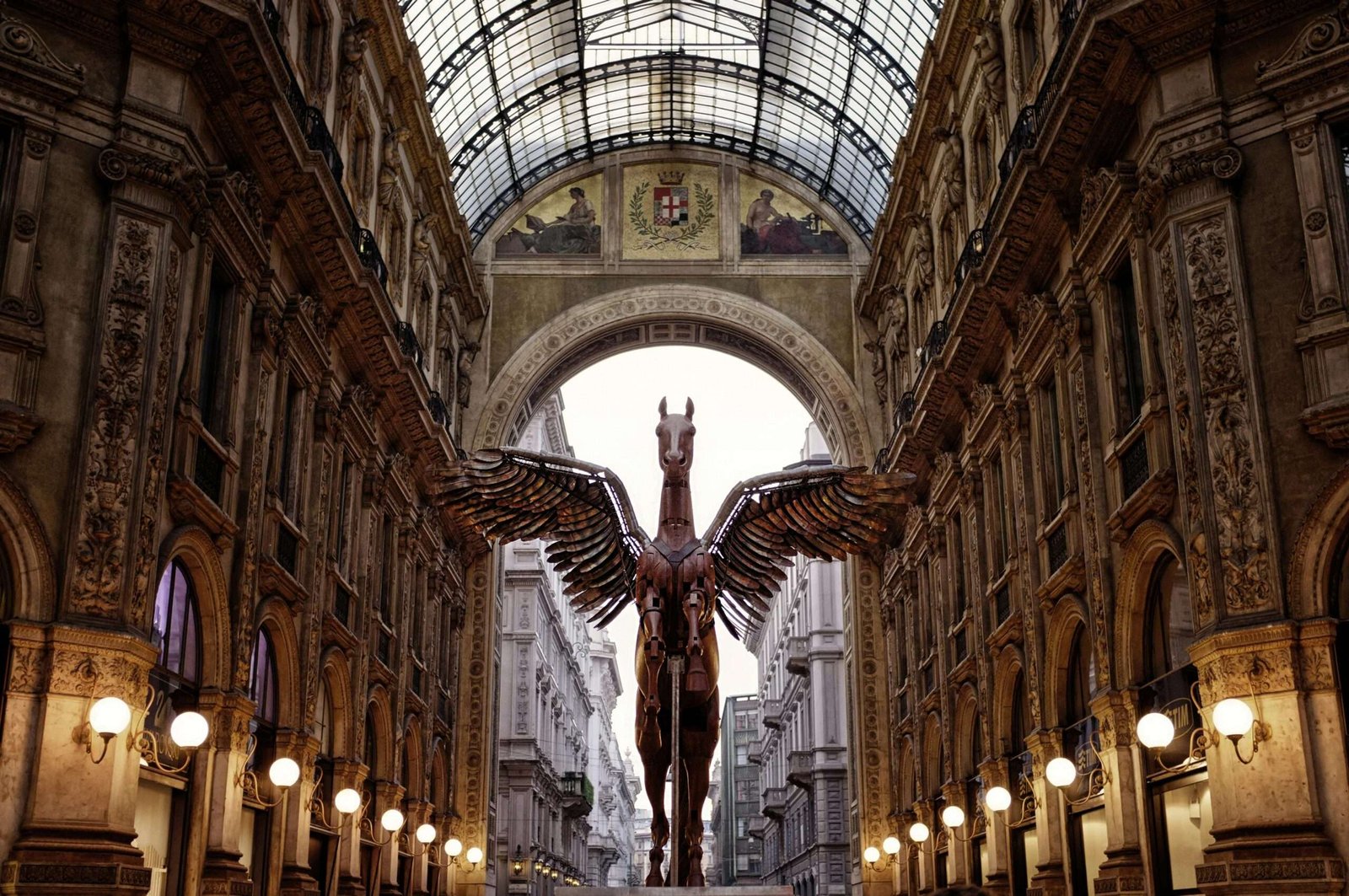 Discover the best things to do in Milan. Featured is a stunning Pegasus sculpture.