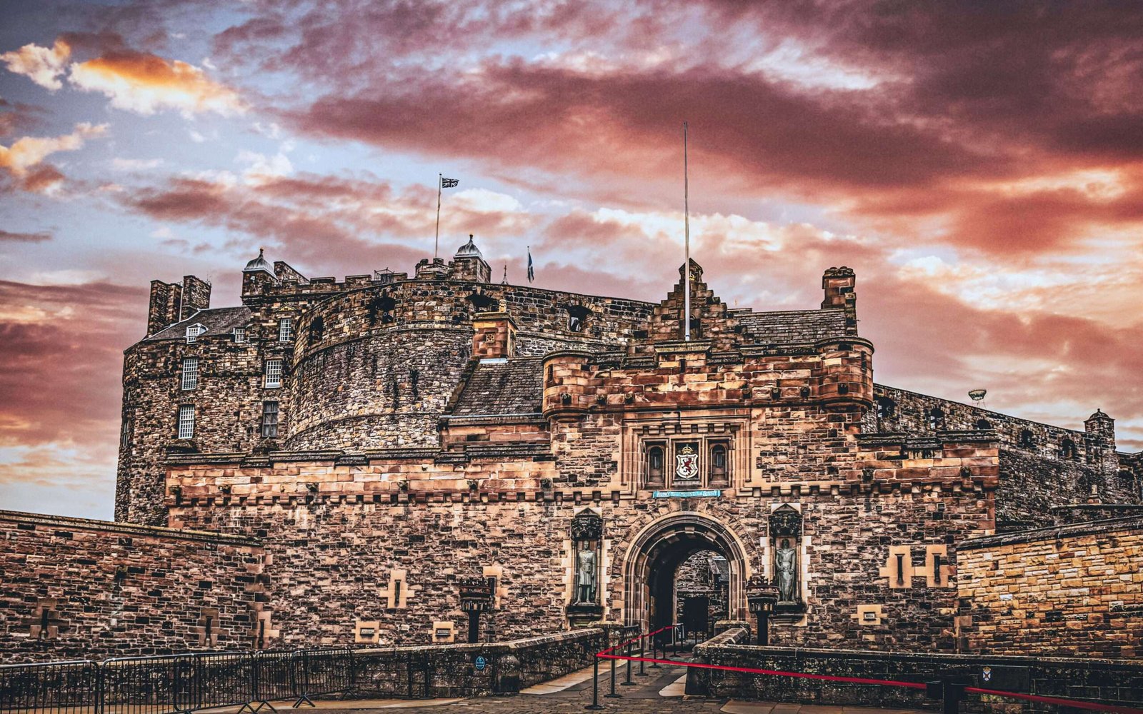 Edinburgh Castle is one of the must-see castles in Europe. Featured is Edinburgh Castle at sunset.